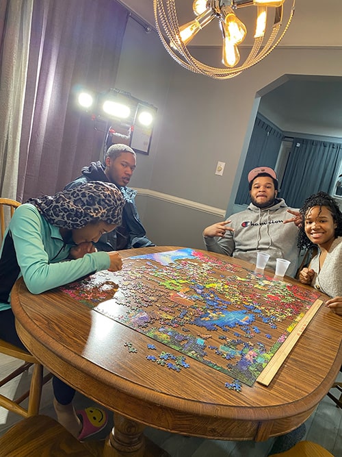 Jerika's children putting together a puzzle