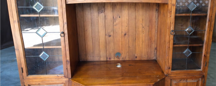 Old entertainment center before flipping
