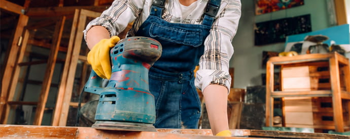 Woman flipping furniture into new piece